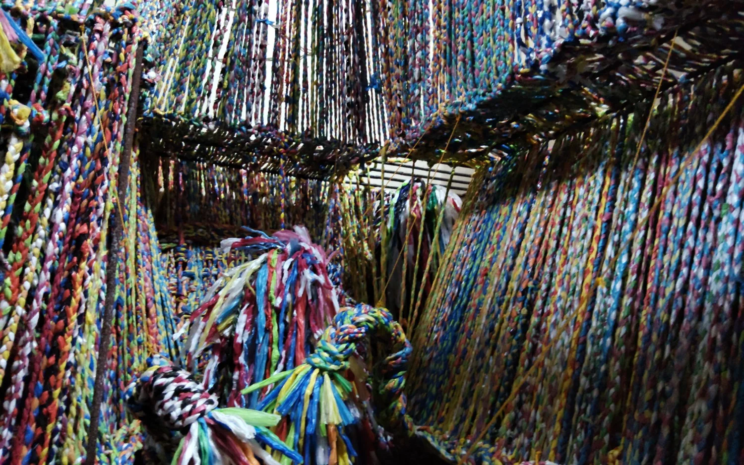 Colorful braided recycled plastic WALASTIK art installation